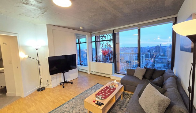 Modern Downtown Apartment with Million City Views