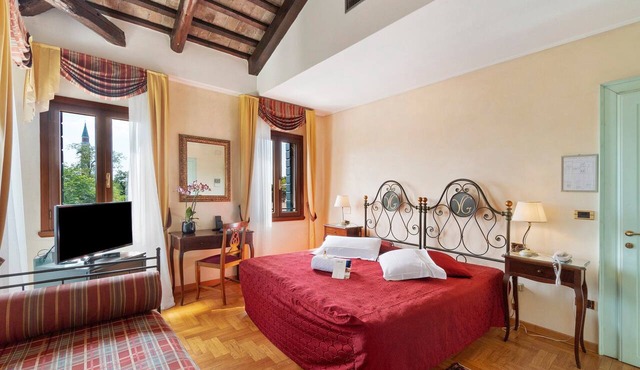 Room 'Villa Goetzen - Camera Tripla' with Wi-Fi and Air Conditioning