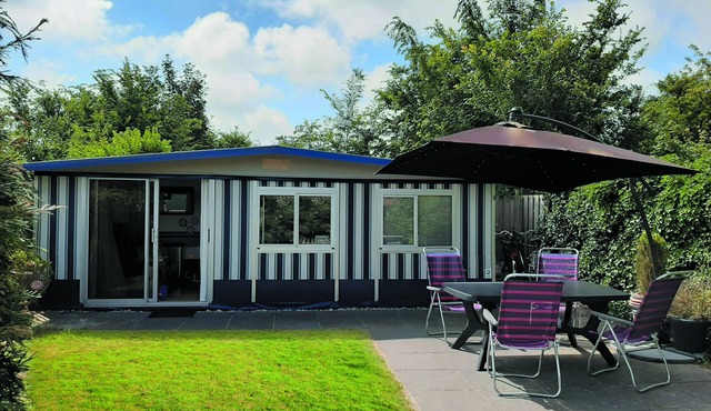 Spacious caravan with fixed awning and sheltered garden