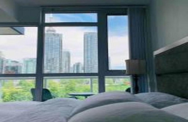 DT King BR + den & balcony