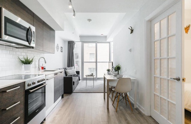 Luxury 2BR Condo steps from Subway