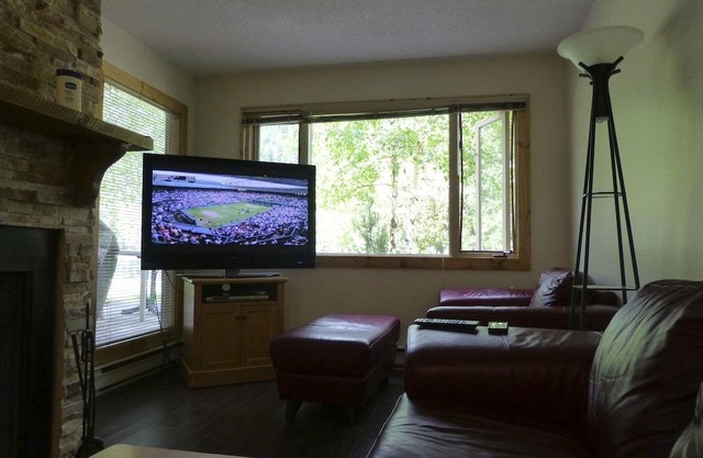 Recently renovated Main Floor 2 Bedroom/2 Bath Condo backing onto Toby Creek