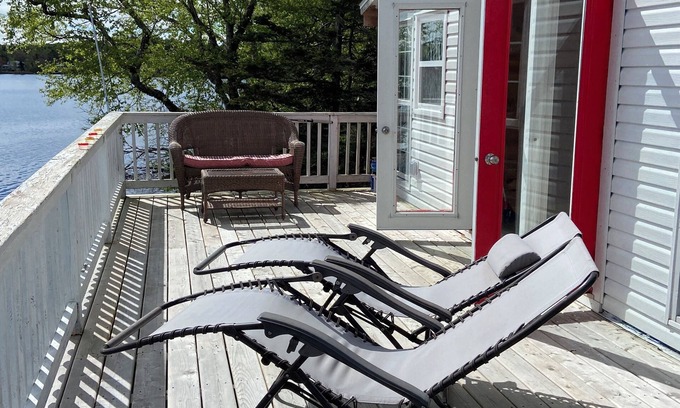 Darlings Lake Cottage | Awesome Lakefront. Step off the lower deck into the water.