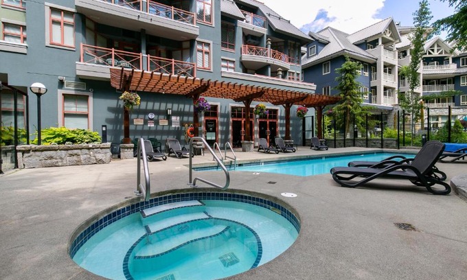 Village North Apartment | Beautiful Whistler Village Alpenglow suite queen size bed air conditioning cable and smartTV WIFI fireplace pool hot tub sauna gym balcony mountain views