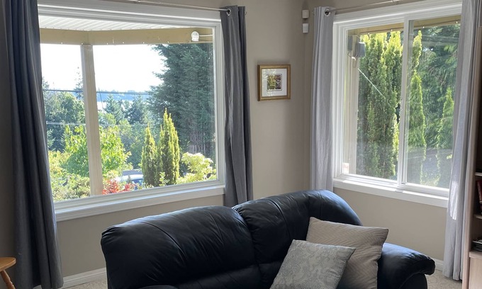 Ladysmith Apartment | Centrally located ocean view suite for work or vacation.