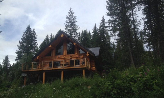 Golden House | Golden Log House above the Valley
