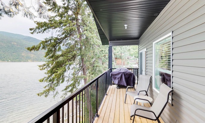 Christina Lake House | Lakeside Home with Peaceful Location, Lovely Views, Private Beach & Dock