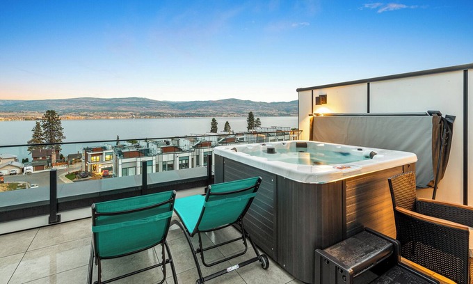 Central Okanagan House | Roof Top Patio w/private beach! 5 minutes to downtown Kelowna & sleeps 15 people