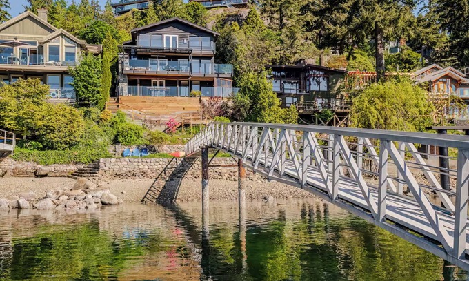 District of North Vancouver House | Stunning Waterfront Deep Cove Home w/Private Dock