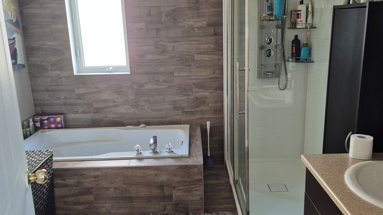 Photo of Bathroom in Les Moulins Regional County Municipality