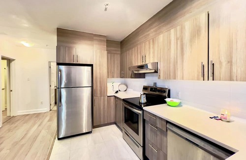 Pierrefonds-Roxboro Apartment | Luxurious Penthouse with River Views & Stunning Sunsets in Tranquil Pierrefonds