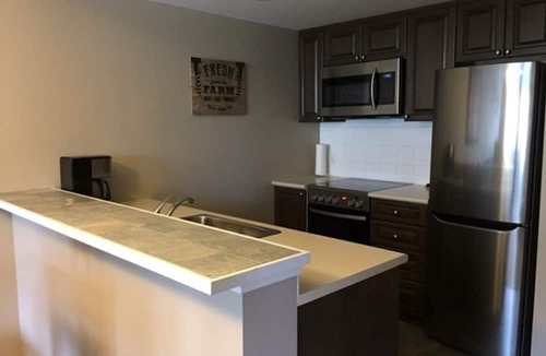 Whistler Cay Heights Condo | Recently updated condo offering spacious living, free parking, pool and hot tub