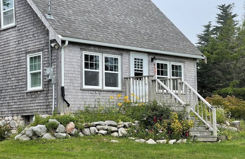 Indian Harbour Cottage | Charming historic oceanfront 2-bedroom cottage in beautiful Indian Harbour.